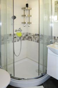 a bathroom with a shower and a sink at Apartment Klarić-1 by Interhome in Trogir