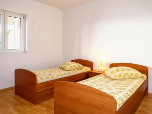 Postel nebo postele na pokoji v ubytování Apartment Buda-3 by Interhome