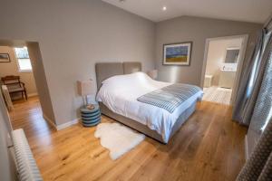 Postel nebo postele na pokoji v ubytování Portree, Isle of Skye