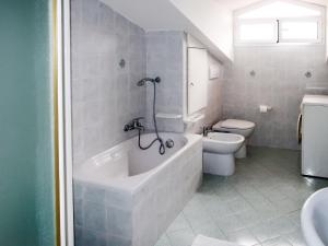 Un baño de Apartment La Colombera-6 by Interhome