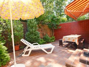Vonkajšia záhrada v ubytovaní Holiday Home Kiwi by Interhome