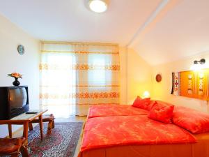 Posteľ alebo postele v izbe v ubytovaní Holiday Home Kiwi by Interhome