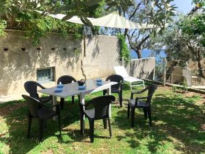 A garden outside Holiday Home Giorgia - BGB100 by Interhome