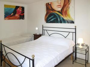 Posteľ alebo postele v izbe v ubytovaní Apartment Arco - SLR350 by Interhome