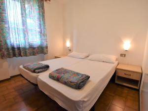 Posteľ alebo postele v izbe v ubytovaní Apartment Basic by Interhome