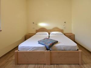 Ένα ή περισσότερα κρεβάτια σε δωμάτιο στο Apartment Comfort-2 by Interhome