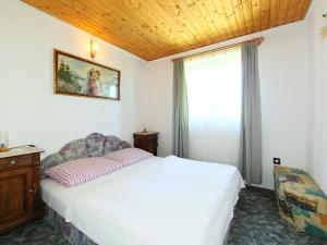 Posteľ alebo postele v izbe v ubytovaní Holiday Home Sunny by Interhome