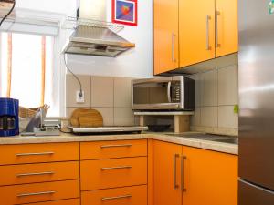 A kitchen or kitchenette at Holiday Home Pino by Interhome
