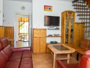 A television and/or entertainment centre at Holiday Home Pino by Interhome