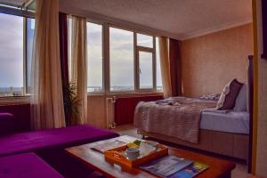 Postel nebo postele na pokoji v ubytování Mekke Hotel Istanbul