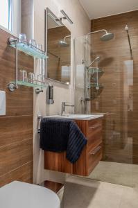 Koupelna v ubytování H&H Apartments Poroszló + 22 fotografií