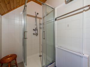 a shower with a glass door in a bathroom at Holiday Home Freesia by Interhome in Fonyód +14 photos