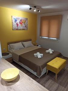 Postel nebo postele na pokoji v ubytování STUDIO-10