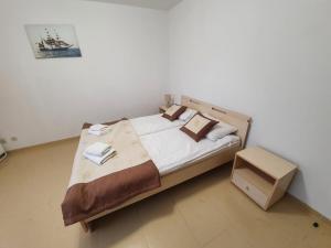 Posteľ alebo postele v izbe v ubytovaní LIDO Apartamenty + 37 fotografií