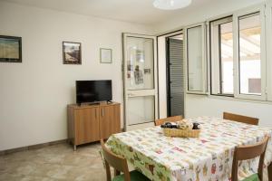 TV a/nebo společenská místnost v ubytování Salento Cecilia - solo settimane intere da sabato a sabato