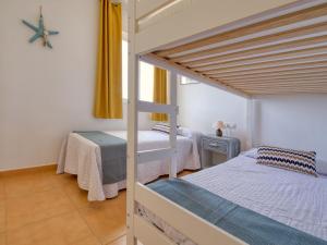 Posteľ alebo postele v izbe v ubytovaní Holiday Home Jardines de Denia I by Interhome