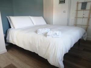 Säng eller sängar i ett rum på CasaMarè