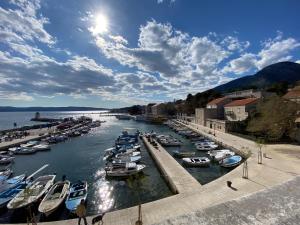 a group of boats are docked in a harbor at Guest House Meri in Bol