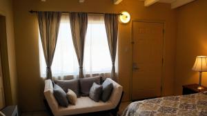 Postel nebo postele na pokoji v ubytování Harmony Motel