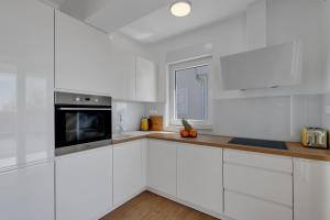 Kuchyň nebo kuchyňský kout v ubytování Holiday home L & B Makarska