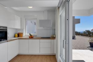 Kuchyň nebo kuchyňský kout v ubytování Holiday home L & B Makarska