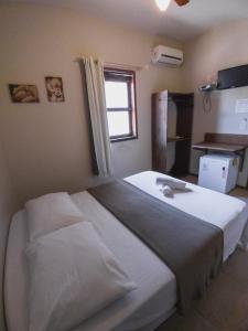 Postel nebo postele na pokoji v ubytování Pousada La Cabana