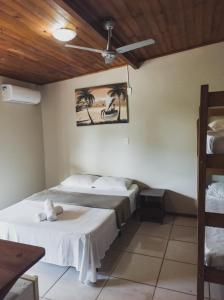 Postel nebo postele na pokoji v ubytování Pousada La Cabana