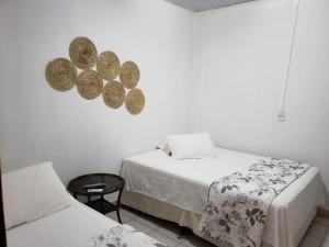 Postel nebo postele na pokoji v ubytování Pousada Martins e Cia