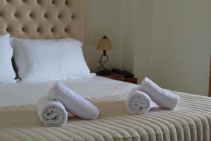 Postel nebo postele na pokoji v ubytování Sofotel