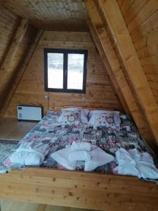 Llit o llits en una habitació de Vikendica Ines