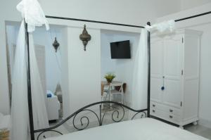 A bed or beds in a room at Santa María 12 Boutique Apartamentos