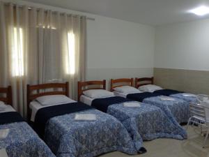 מיטה או מיטות בחדר ב-Luz & Mar