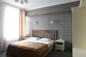 Postel nebo postele na pokoji v ubytování Central Hotel + 33 fotografií