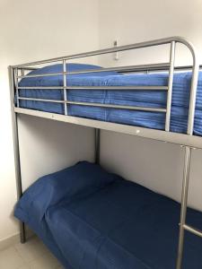 Katil dua tingkat atau katil-katil dua tingkat dalam bilik di Maeva Flat