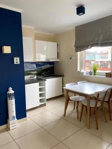 Kuchyň nebo kuchyňský kout v ubytování Baltic Cliff Apartamenty