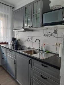 Kuchyň nebo kuchyňský kout v ubytování Privatzimmer König + 2 fotografie