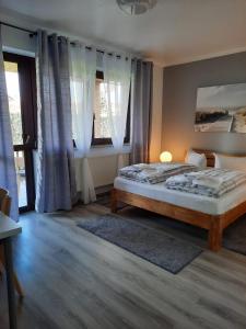 Postel nebo postele na pokoji v ubytování Privatzimmer König