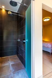 Kylpyhuone majoituspaikassa Vlaamse Ardennen Vakantiehuis Casa Caliente met wellness