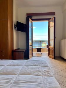 Postel nebo postele na pokoji v ubytování Sofotel