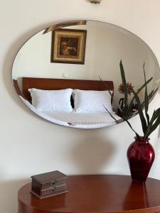 Postel nebo postele na pokoji v ubytování Sofotel