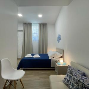 Ein Bett oder Betten in einem Zimmer der Unterkunft La Quercia