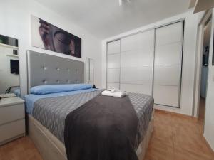 Posteľ alebo postele v izbe v ubytovaní Surycan, beautiful apartment in maspalomas + 37 fotografií
