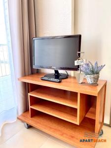 TV a/nebo společenská místnost v ubytování APARTBEACH ADRIATICO 518 VISTAS PLAYA y CLIMATIZADO