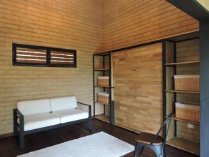Voodi või voodid majutusasutuse Palagua Lodge toas