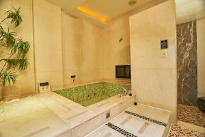 Voodi või voodid majutusasutuse Dongfeng Motel toas