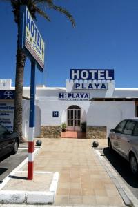 a hotel playa sign in front of a building at Hotel Playa in Mojácar