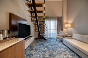 TV a/nebo společenská místnost v ubytování BN Hotel Thermal & Wellness
