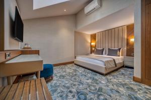 Postel nebo postele na pokoji v ubytování BN Hotel Thermal & Wellness