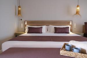 Posteľ alebo postele v izbe v ubytovaní Eques Petit Resort