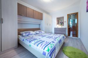 Posteľ alebo postele v izbe v ubytovaní Guest House Kuna